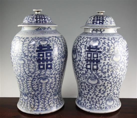 Two Chinese blue and white double joy baluster jars and covers, 19th century, 45cm & 45.5cm